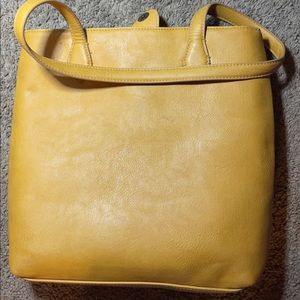Worn mustard yellow Universal Thread handbag